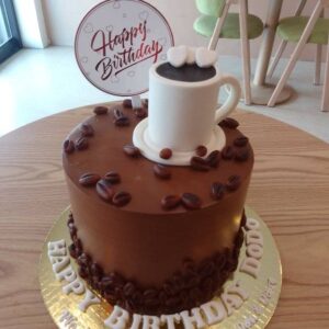 Coffee themed birthday money pulling cake by Pipie Co.